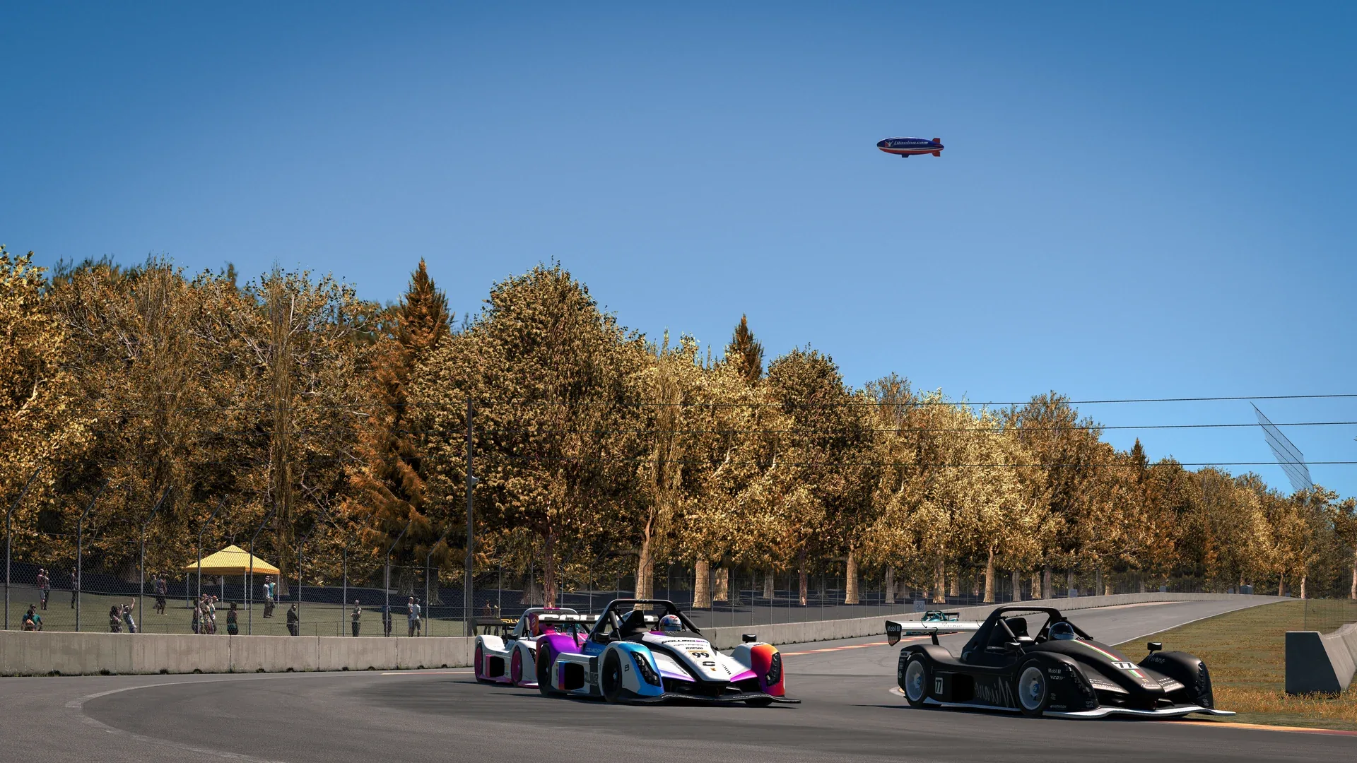 Radical SR10 cars racing past autumn trees at Road America during VCO INFINITY 2026 on iRacing.